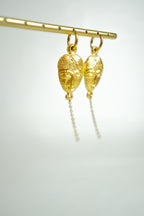 Les boucles d'oreilles YASMIN