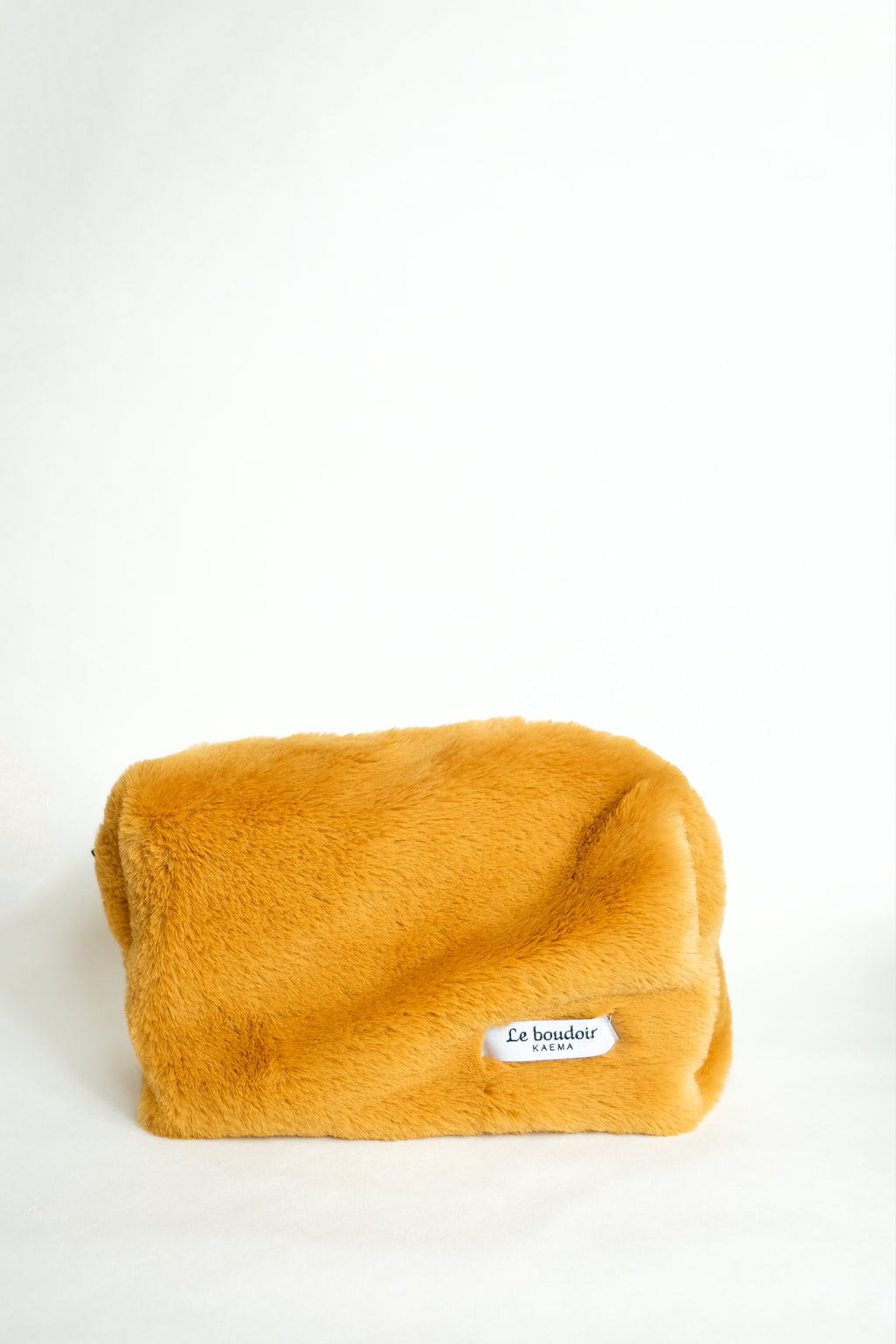 La beauty case "fourrure moutarde"