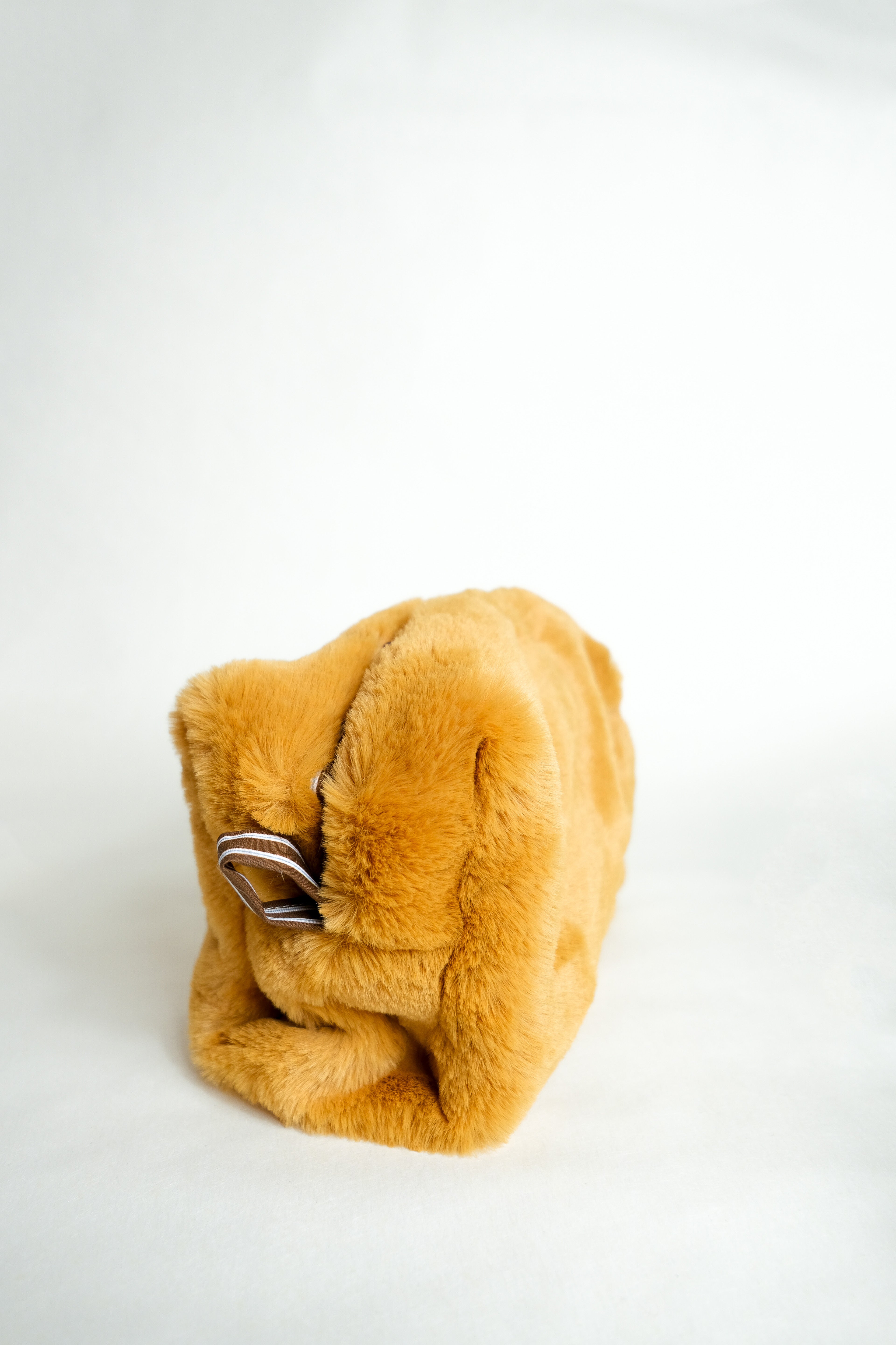 La beauty case "fourrure moutarde"