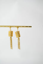 Les boucles d'oreilles BLY