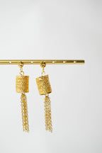 Les boucles d'oreilles BLY
