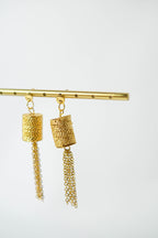 Les boucles d'oreilles BLY