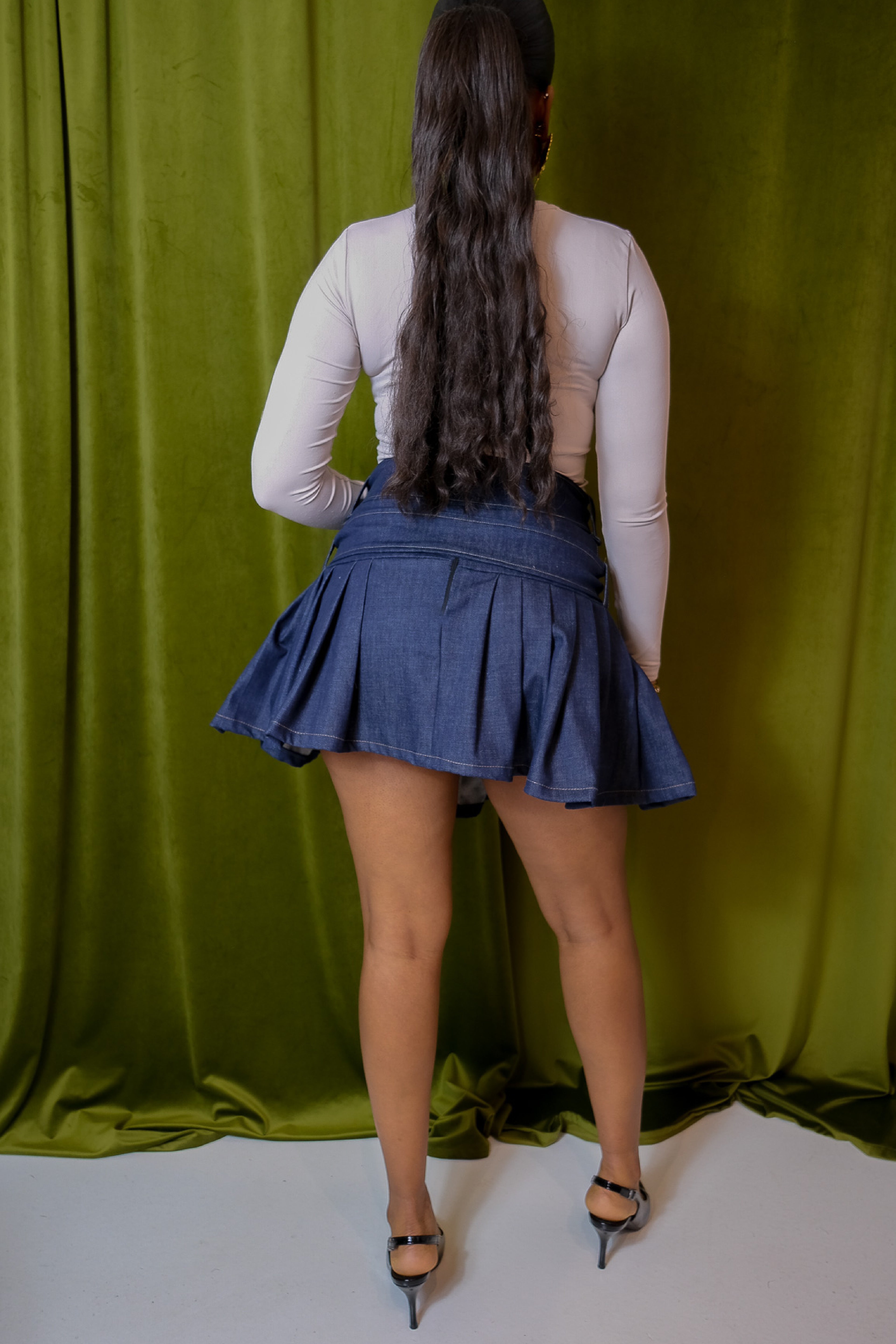 La jupe courte plissée KEVYNE